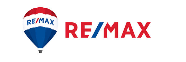 Logotipo de RE/MAX que presenta un globo aerostático con secciones rojas, blancas y azules y la palabra "RE/MAX" escrita en fuente roja y azul, que recuerda el espíritu vibrante visto en la Feria de Empleo 2019.