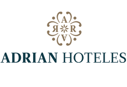 Logotipo de Adrian Hotels que presenta un emblema decorativo con elementos de diseño intrincados encima del texto "ADRIAN HOTELS.